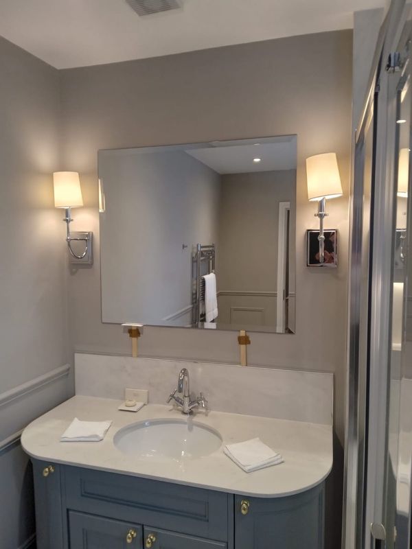 Custom Bathroom and Bedroom Mirror Installation - Image 1